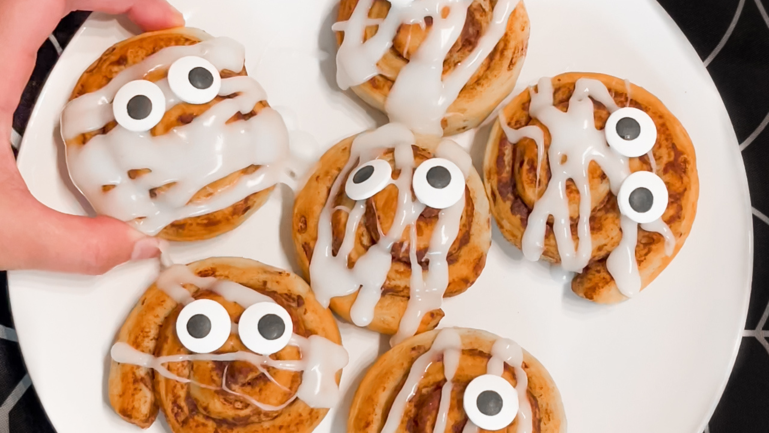There you have it, the simplest and most adorable Halloween breakfast idea. Quick & Easy Mummy Cinnamon Rolls are the perfect way to add a touch of Halloween spirit to your morning
